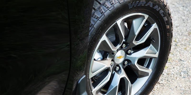 Close-up of the Chevrolet Silverado's wheel and rugged tire