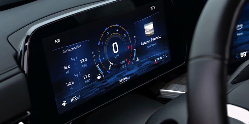 A close-up of the digital dashboard and instrument cluster inside the 2025 Chevrolet Tahoe